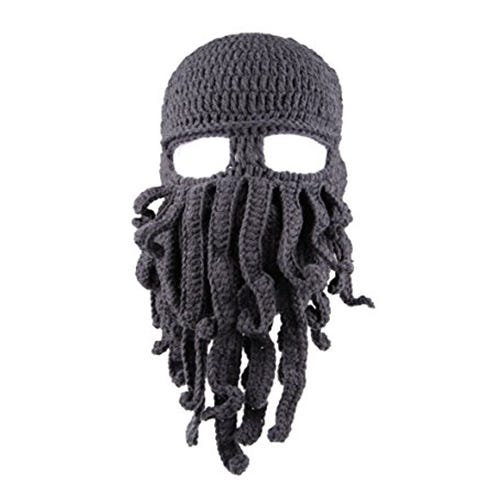 Hair, Dreadlocks, Beanie, Hairstyle, Head, Facial hair, Beard, Knit cap, Headgear, Cap, 