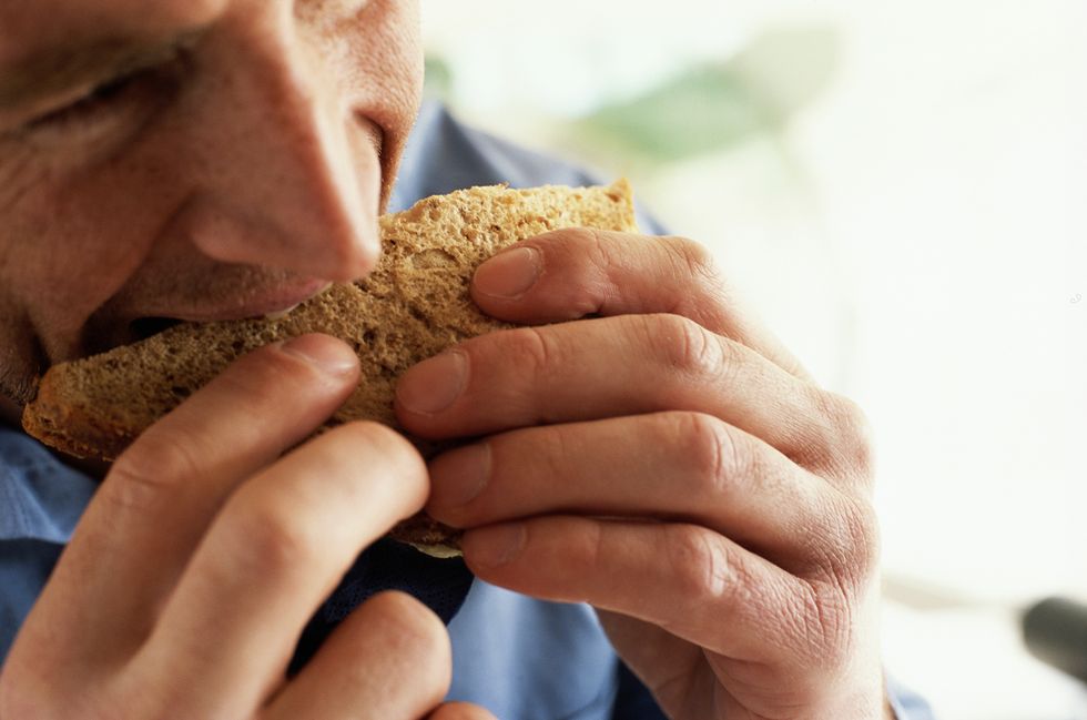 man eating sandwich