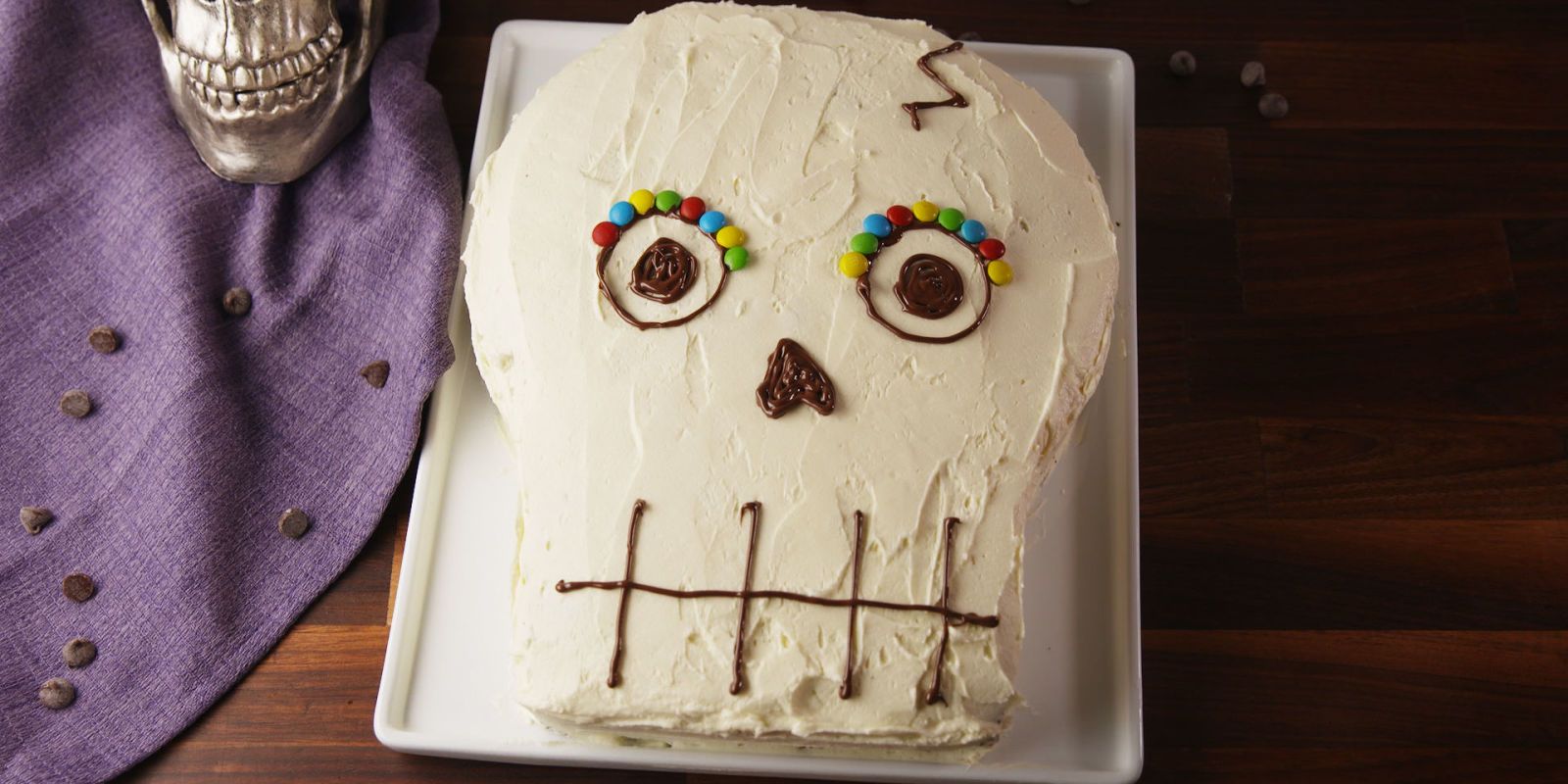 Day of the Dead Burgundy and White Skulls cake - Bay Tree Cakes