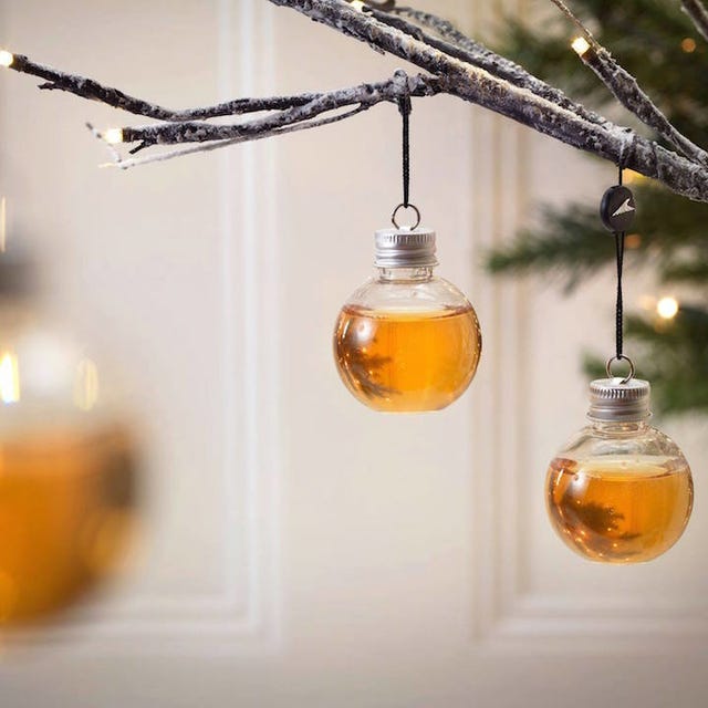 Yellow, Mason jar, Amber, Branch, Glass bottle, Tree, Twig, Fashion accessory, Ornament, Glass, 