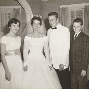 Photograph, People, Dress, Standing, Gown, Snapshot, Formal wear, Ceremony, Vintage clothing, Wedding dress, Photograph, People, Dress, Standing, Gown, Snapshot, Formal wear, Ceremony, Vintage clothing, Wedding dress,