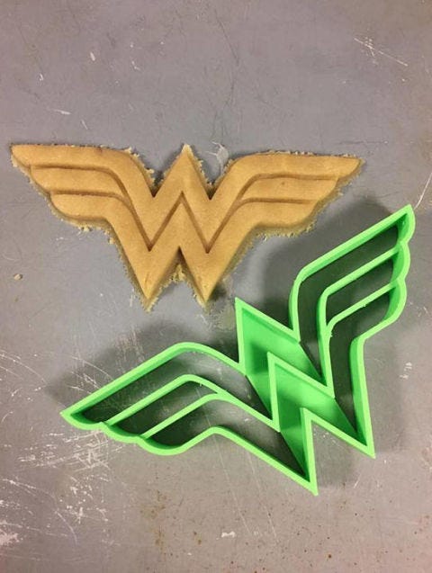 Green, Logo, Font, Fictional character, Graphics, Emblem, Symbol, 