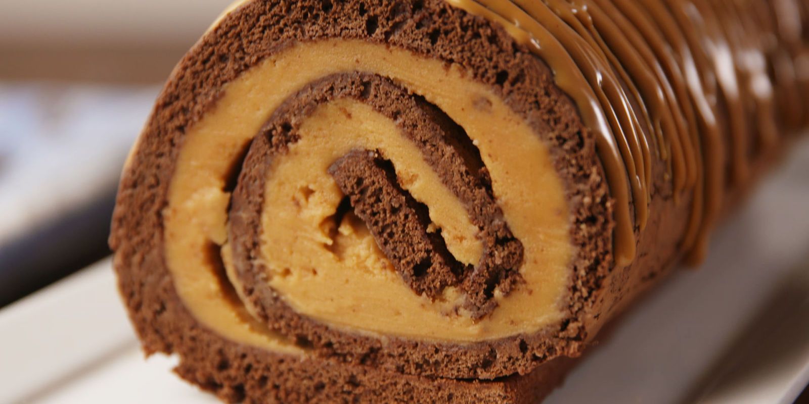 Chocolate Roll Cake With Peanut Butter Buttercream Frosting Recipe -  Tablespoon.com
