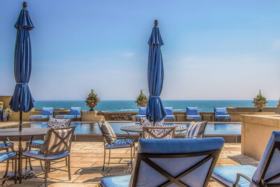 Blue, Property, Furniture, Azure, Table, Room, Real estate, Vacation, Sea, Roof, 
