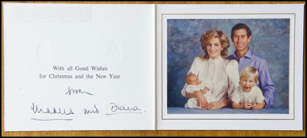 Born just three months before Christmas, Prince Harry makes his first appearance on a royal Christmas card in this 1984 greeting. An excited Prince William hams it up for the camera.