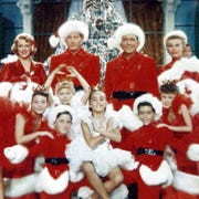 Rosemary Clooney, Danny Kaye, Bing Crosby, Vera-Ellen and children pose for picture in a scene from the film 'White Christmas', 1954. Rosemary Clooney, Danny Kaye, Bing Crosby, Vera-Ellen and children pose for picture in a scene from the film 'White Christmas', 1954.
