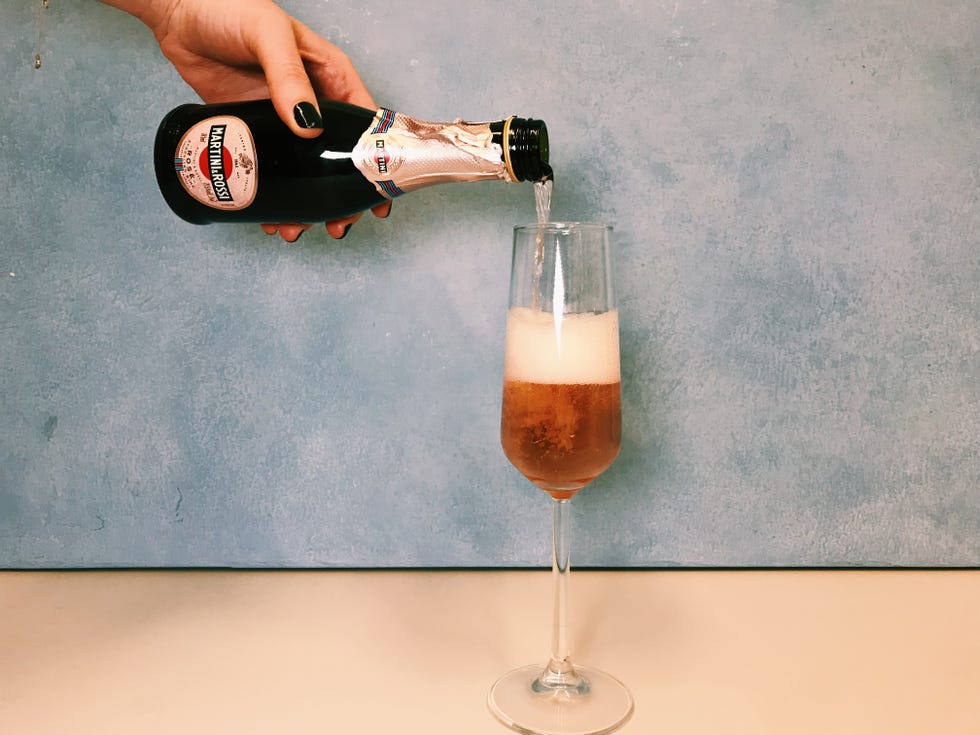 Drink, Alcoholic beverage, Liqueur, Distilled beverage, Bottle, Glass bottle, Champagne cocktail, Alcohol, Wine glass, Stemware, 