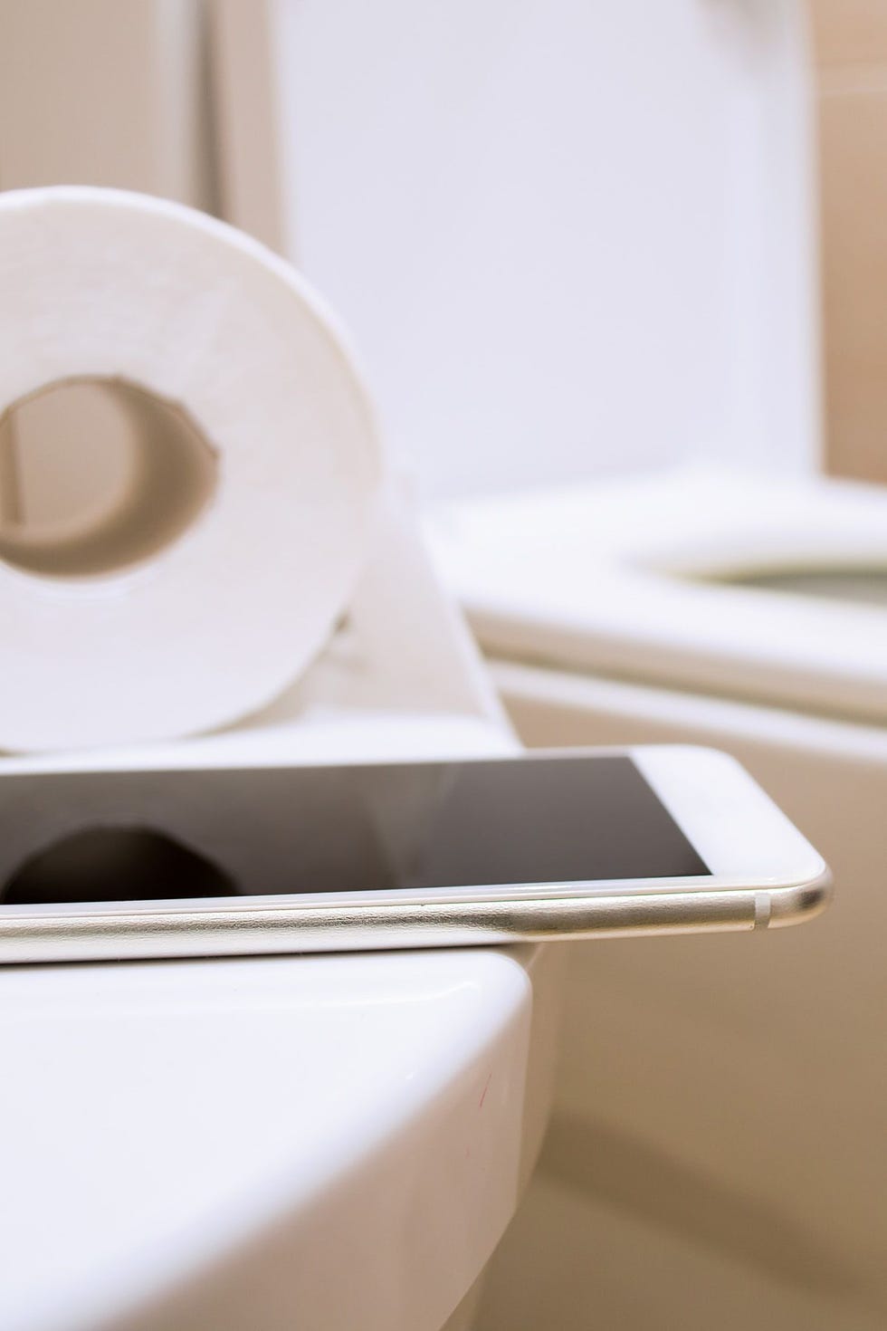 White, Toilet seat, Table, Furniture, Toilet, Material property, Room, Tableware, Bathroom, Interior design, 