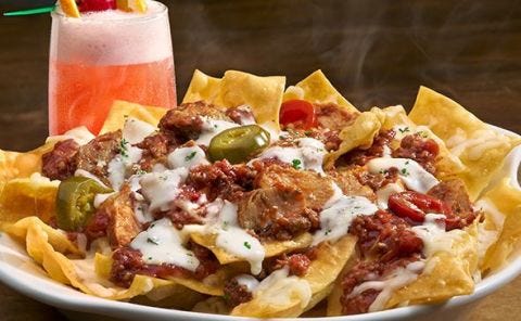 Dish, Food, Cuisine, Junk food, Ingredient, Nachos, Tortilla chip, Frito pie, Fast food, Meat, 