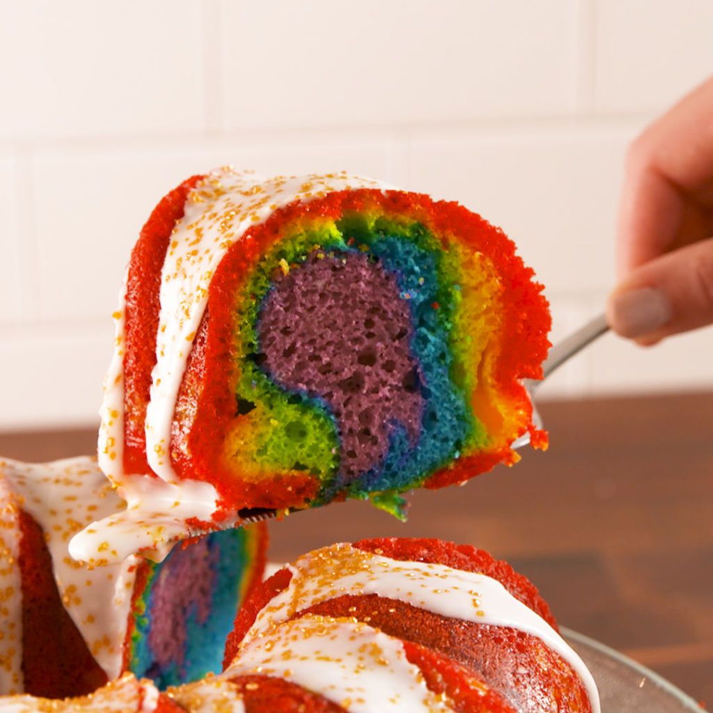 https://hips.hearstapps.com/del.h-cdn.co/assets/18/07/1024x1024/square-1518823599-delish-rainbow-bundt-cake-still008.jpg?resize=1200:*