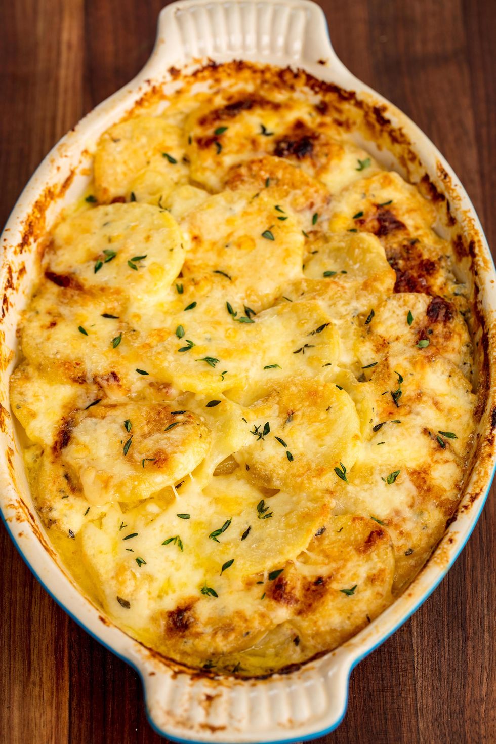 https://hips.hearstapps.com/del.h-cdn.co/assets/18/08/1519322290-potatoes-au-gratin-vertical.jpg?crop=1.0xw:1xh;center,top&resize=980:*