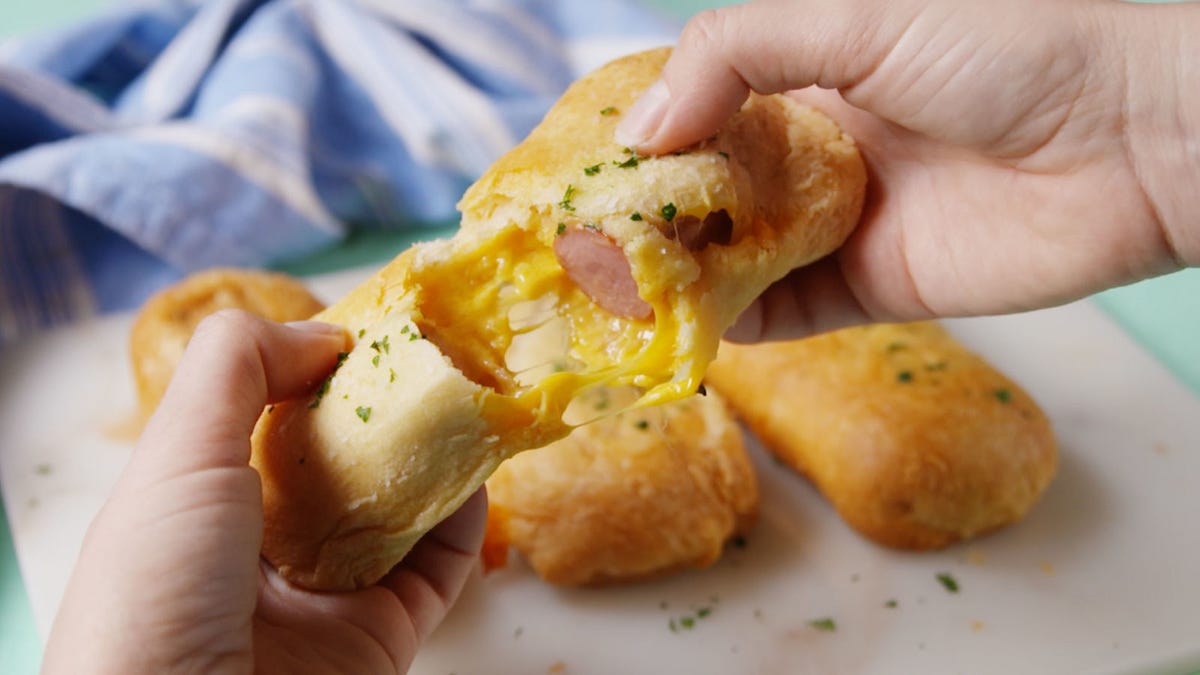 Video player poster image preview for These Cheesy Hot Dogs Are A Dinnertime Favorite