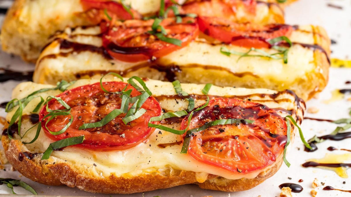 Video player poster image preview for You're Going to Wish this Caprese Garlic Bread was Free at Every Restaurant!