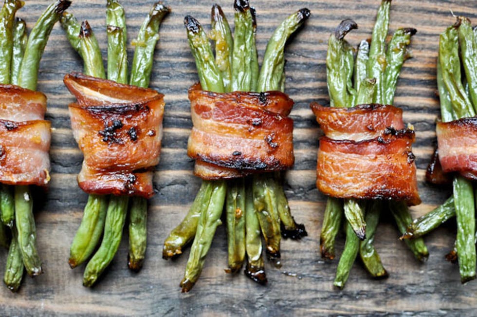 <p>Brush on brown sugar and garlic, tie together with bacon, and green beans transform into to a savory, crispy veggie treat.</p>
<p>Get the recipe at <a href="http://www.howsweeteats.com/2011/06/green-bean-bacon-bundles/" target="_blank">How Sweet It Is</a>.</p>
