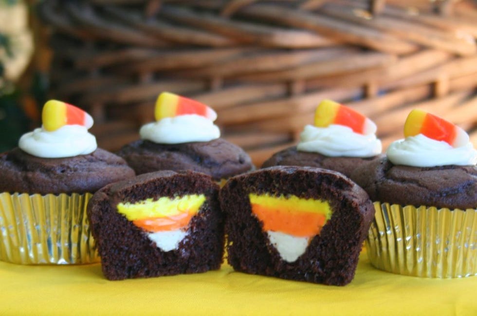 <p>There's a trick to this amazing treat; prepare to wow the kids this Halloween with this simple chocolate cupcake with a devilishly clever surprise hidden inside.</p>
<p><strong>Recipe:</strong> <a href="http://sugarturntable.com/?p=1401"><strong>Candy Corn Cupcakes</strong></a></p>