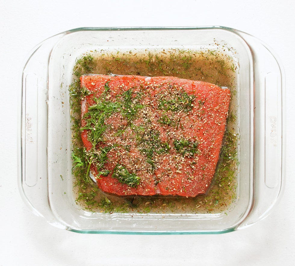 <p>Let the salmon cure (refrigerated) for at least three days, flipping the salmon and basting it with the juices that have collected roughly every 12 hours. The flesh will be firmer, darker, and more intensely colored (like pictured) when it's ready to be sliced and served.</p>