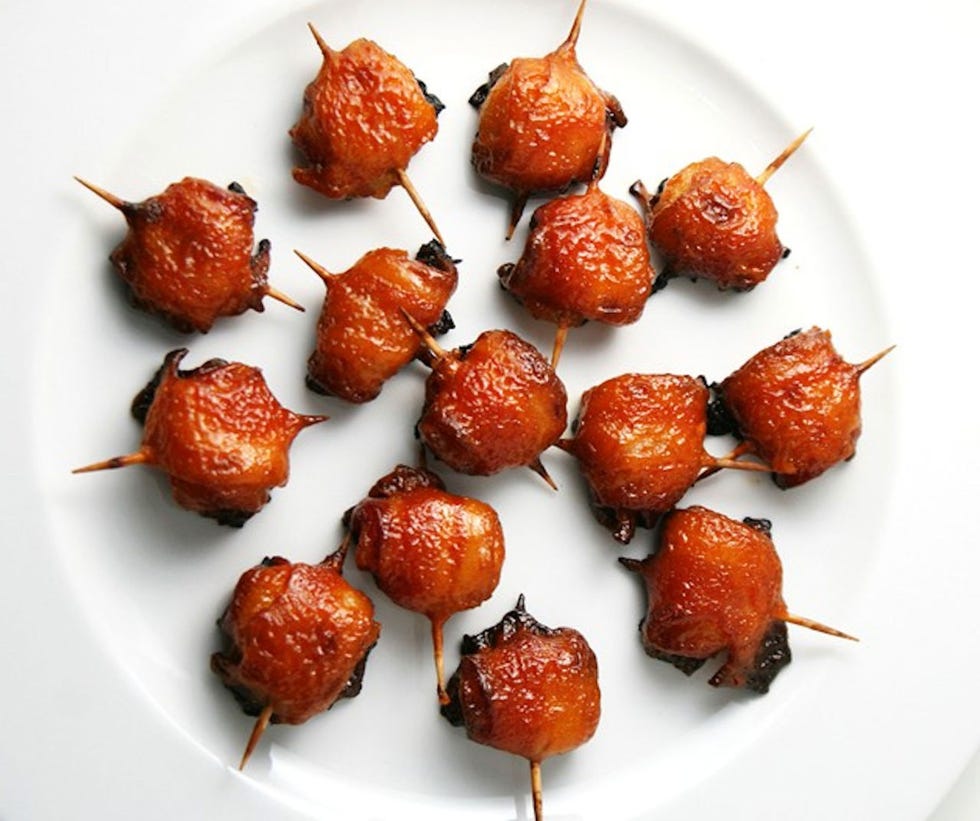 <p>Sink your teeth into the double-crunch of bacon and water chestnuts—they make for perfect, brown-sugar-glazed cocktail-party appetizers.</p>
<p>Get the recipe at <a href="http://savorysweetlife.com/2009/12/appetizer-bacon-wrapped-water-chestnuts/" target="_blank">Savory Sweet Life</a>.</p>

