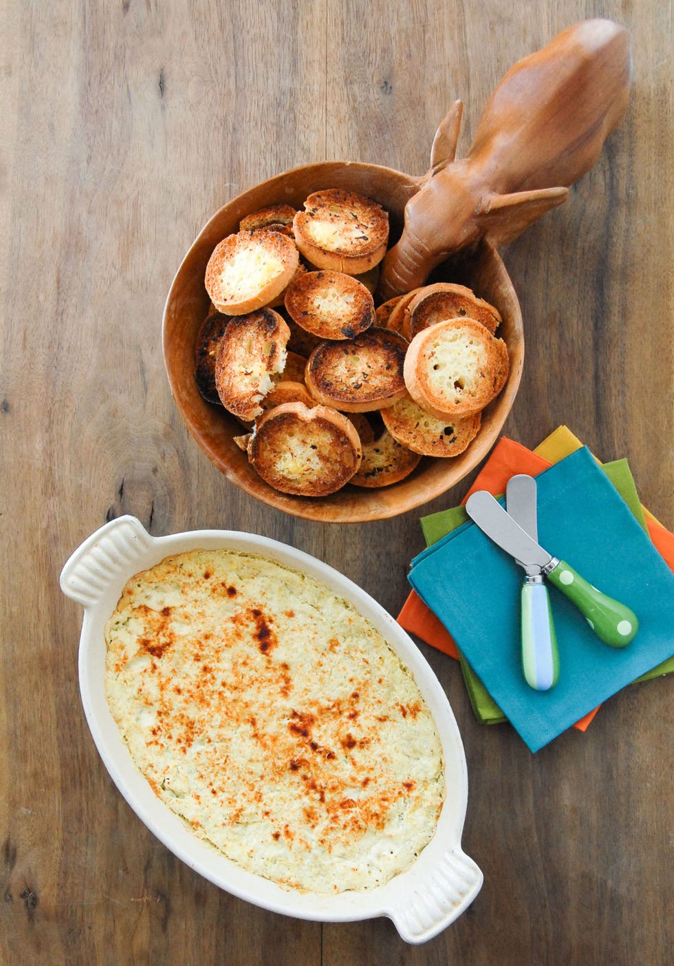 <p>In this recipe, Parmesan, Neufchatel, and Parmigiano-Reggiano mix with seasonings like garlic and paprika (and a touch of hot sauce) for a thick, creamy compliment to crisp, gluten-free dippers.</p>
<p>Get the recipe at <a href="http://boulderlocavore.com/2013/01/creamy-hot-artichoke-dip-with-garlic-toast-rounds-gluten-free.html">Boulder Locavore</a>.</p>