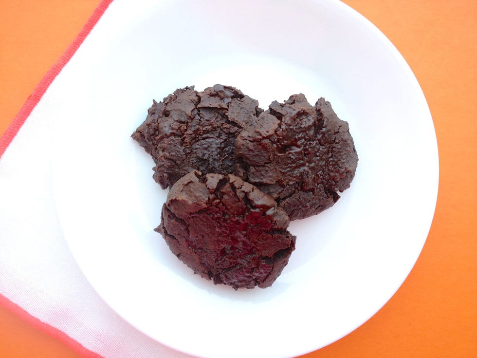 Fudgy Morning Mocha Cookies <div class="imageContent">
<p>Coffee lovers, these are for you. Pair your morning latte with this protein-powered mocha cookie. The secret ingredient: black beans! They give this bite-sized treat a great chewy, brownie-like texture — and you can't even taste 'em.</p>
<p><em>MAKES: 2 dozen cookies</em></p>
<p>• 1 (15-oz.) can black beans, drained<br /> • 1/2 cup cocoa powder<br /> • 1/4 cup whole-wheat pastry flour<br /> • 1/2 teaspoon baking powder<br /> • 1/2 cup packed dark brown sugar<br /> • 1 large egg<br /> • 3 tablespoons olive oil<br /> • 1 tablespoon instant espresso powder<br /> • 1 tablespoon vanilla extract<br /> • 4 oz. dark chocolate chopped</p>
<p>1. Preheat oven to 350 degrees F.<br /> 2. In food processor, pulse beans until coarsely chopped. Whisk cocoa, flour and baking powder in bowl. Add to processor along with brown sugar, egg, olive oil, espresso powder and vanilla. Pulse until smooth. Fold in dark chocolate.<br /> 3. Scoop rounded tablespoonfuls dough onto parchment-lined cookie sheets. Bake 15 to 20 minutes, or until set. Remove from oven; flatten cookies with offset spatula. Transfer to a wire rack to cool. Cover and chill 15 minutes before eating.</p>
</div>