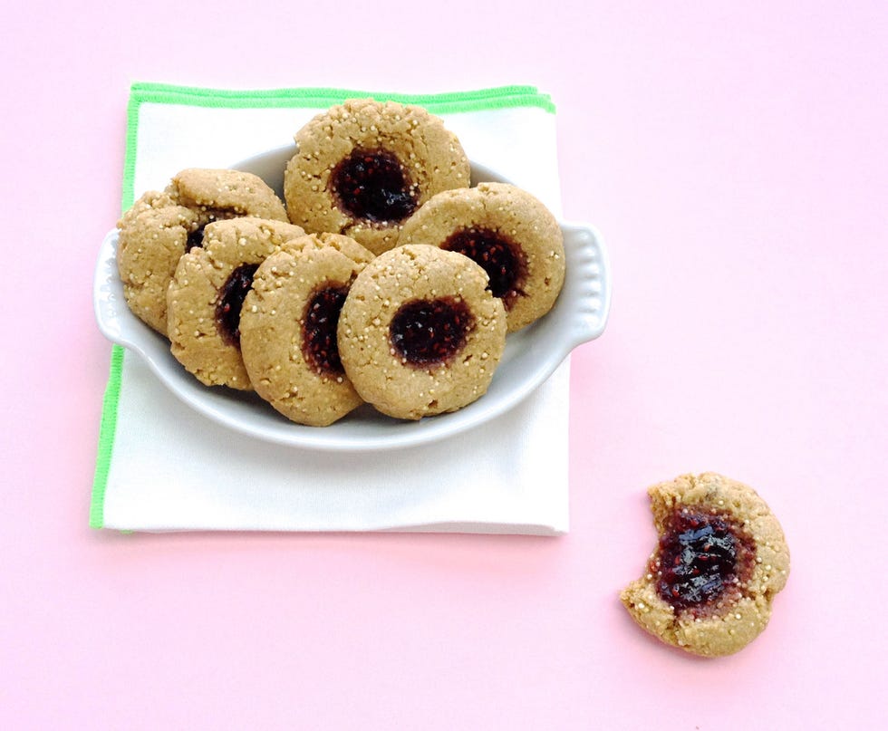 Quinoa Peanut Butter and Jelly Thumbprints <div class="imageContent">
<p>What gives these peanut butter and jelly cookies this delicious crunch? Quinoa! The more you add, the crunchier these babies get. We love the way raspberry jam offsets the saltiness of the dough, but feel free to swap in your favorite flavor, like strawberry or grape.</p>
<p><em>MAKES: 2 dozen cookies</em></p>
<p>• 1 cup whole-wheat pastry flour<br /> • 1/2 cup to 3/4 cup quinoa<br /> • 1 teaspoon baking powder<br /> • 1/4 teaspoon salt<br /> • 3 tablespoons butter, at room temperature<br /> • 1/2 cup packed dark brown sugar<br /> • 3/4 cup peanut butter<br /> • 1 large egg<br /> • 2 teaspoon vanilla extract<br /> • Raspberry jam, for filling</p>
<p>1. Preheat oven to 350 degrees F.<br /> 2. In a large bowl, whisk flour, quinoa, baking powder and salt.<br /> 3. Beat butter and brown sugar with mixer on medium 2 minutes, or until light and fluffy. Beat in peanut butter. Beat in egg until combined, scraping down bowl as needed. Beat in vanilla. <br /> 4. Roll tablespoonfuls dough into balls and arrange on parchment-lined cookie sheets. Flatten balls with palm of your hand, then make indents in centers using your thumb. Fill indents with jam. Bake 10 to 13 minutes, or until golden. Transfer to wire racks to cool.</p>
</div>