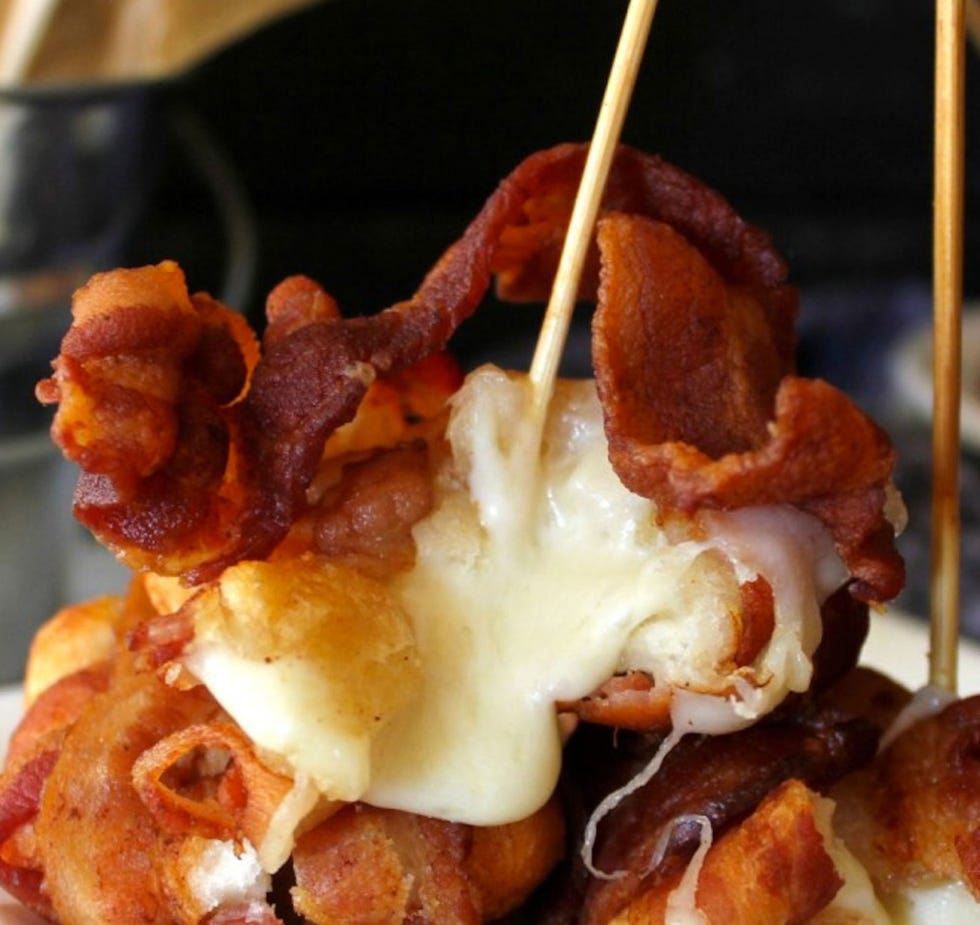 <p>Sure, these might be a heart attack waiting to happen. But just look at them! Melted mozzarella cheese, inside a biscuit, covered in bacon… We're speechless.</p>
<p>Get the recipe at <a href="http://www.ohbiteit.com/2013/04/cheesy-bacon-bombs.html" target="_blank">Oh Bite It</a>.</p>
