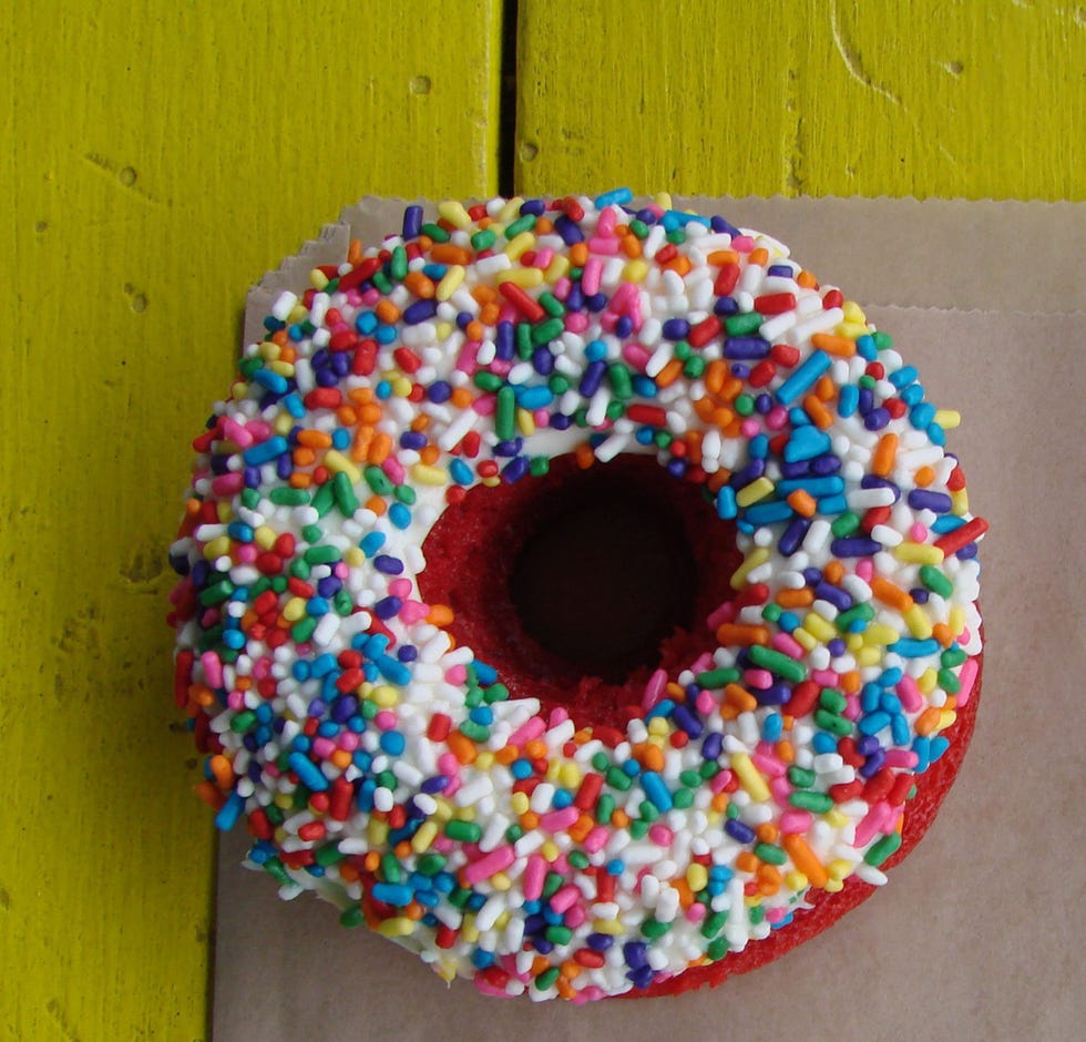 <p><strong>Red Velvet Fonuts</strong></p>
<p>We're suckers for red velvet anything, and thanks to <a href="https://fonuts.com/">Fonuts</a>' use of baking rather than frying, we will be enjoying them guilt free, thank you very much.</p>
<p>1 ¾ cups all-purpose flour</p>
<p>1 cup sugar</p>
<p>¾ tsp baking soda</p>
<p>¾ tsp salt</p>
<p>1 tsp cocoa powder (unsweetened)</p>
<p>1 cup oil (vegetable or canola)</p>
<p>1 ¼ cups buttermilk</p>
<p>2 eggs</p>
<p>¾ oz red food coloring</p>
<p>¾ tsp vinegar, distilled</p>
<p>¾ tsp vanilla extract</p>
<p> </p>
<p>Combine flour, sugar, baking soda, salt, and cocoa powder and mix well.</p>
<p>Separately, combine oil, buttermilk, eggs, food coloring, and vanilla.</p>
<p>In a large bowl, use a large spatula or stand mixer to combine wet and dry ingredients just until combined, being careful not to overmix. If small lumps still exist, that is alright. Add the vinegar at the end and stir to combine thoroughly.</p>
<p>Fill molds ¾-full and bake at 350F, about 8 to 12 minutes, just until center is set. It should spring back if you lightly touch the middle with your finger.</p>
<p><strong>For the frosting:</strong> Blend 1 pound (16 oz) room-temperature cream cheese and blend until smooth. Add sifted powder sugar until you reach desired sweetness. You can also add a teaspoon for lemon juice for extra flavor.</p>
<p>Using a piping bag fitted with pastry tip or an offset spatula, spread desired amount on donuts, then dip into sprinkles. </p>