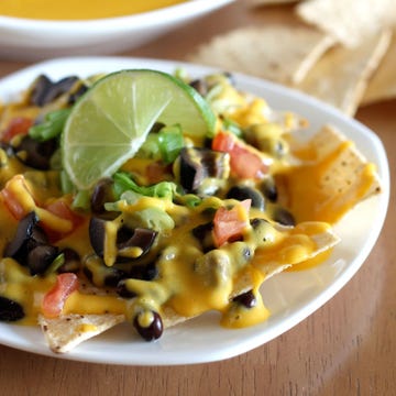 <p>Not only is this recipe gluten-free, it's also vegan, soy-, nut-, and corn-free, meaning no one will find anything to not like. Drizzle over nachos or use as a dipping sauce for veggies like broccoli and cauliflower.</p>
<p>Get the recipe at <a href="http://veganyumminess.com/vegan-nacho-cheese/">Vegan Yumminess</a>.</p>