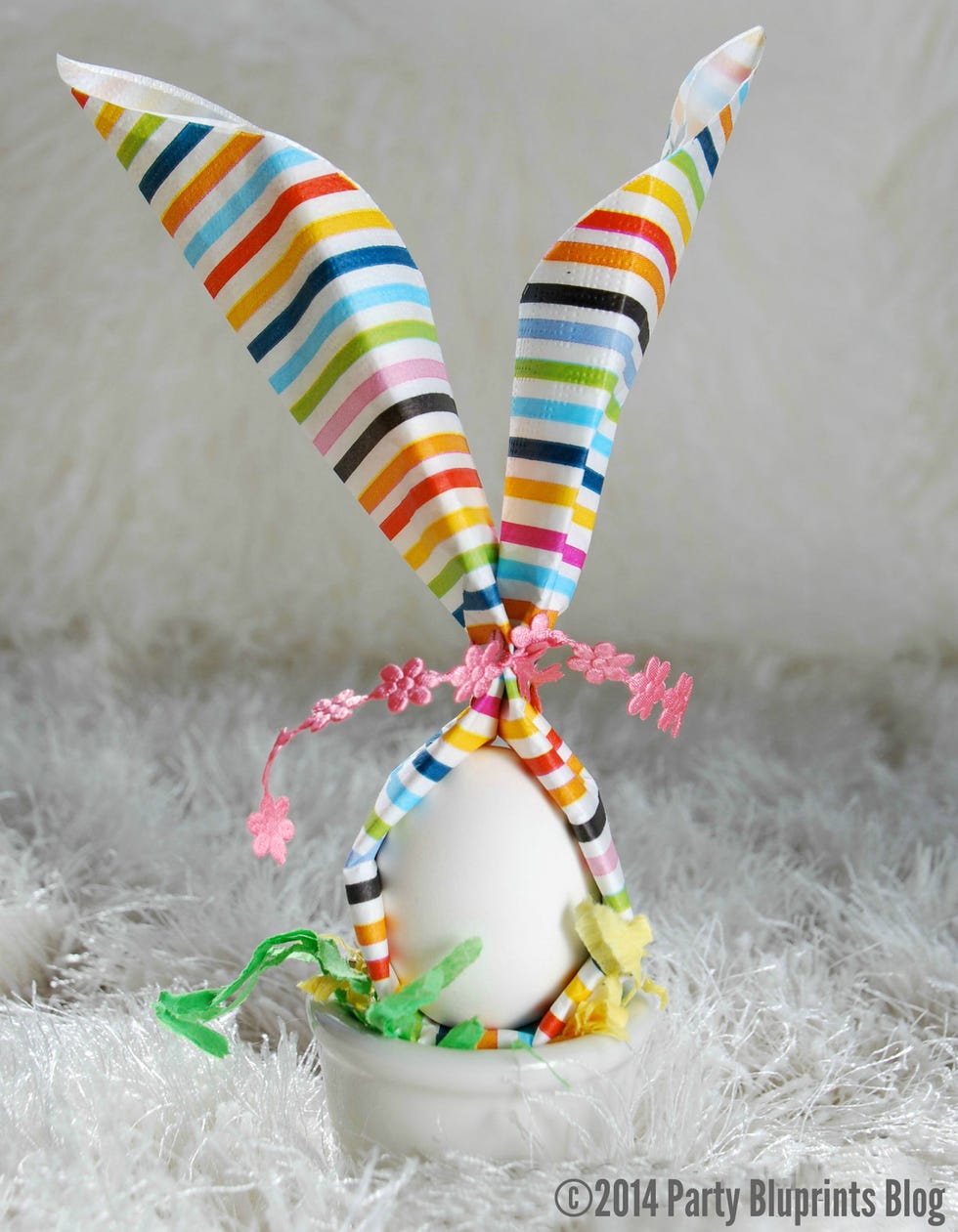 <p>Move over dyed Easter eggs. This edible hard-boiled egg is all dressed up for the holiday and ready to bring on smiles! Top off each place setting at your table with this whimsical addition.</p>
<p><a href="http://www.partybluprintsblog.com/partythemes/" target="_blank"><strong>Click for the recipe.</strong></a></p>