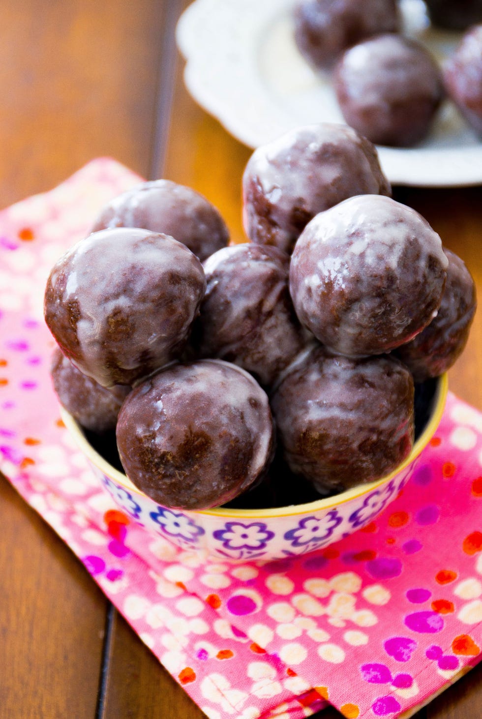 <p>When it comes to doughnuts, we firmly believe that you can never have enough glaze. This bite-size version is coated in a thicker variety, made with a hint of lemon juice, for a slightly tart flavor and a little pucker.</p>
<p><strong>Get the recipe at <a href="http://sallysbakingaddiction.com/2013/09/06/glazed-chocolate-donut-holes/">Sally's Baking Addiction</a>.</strong></p>