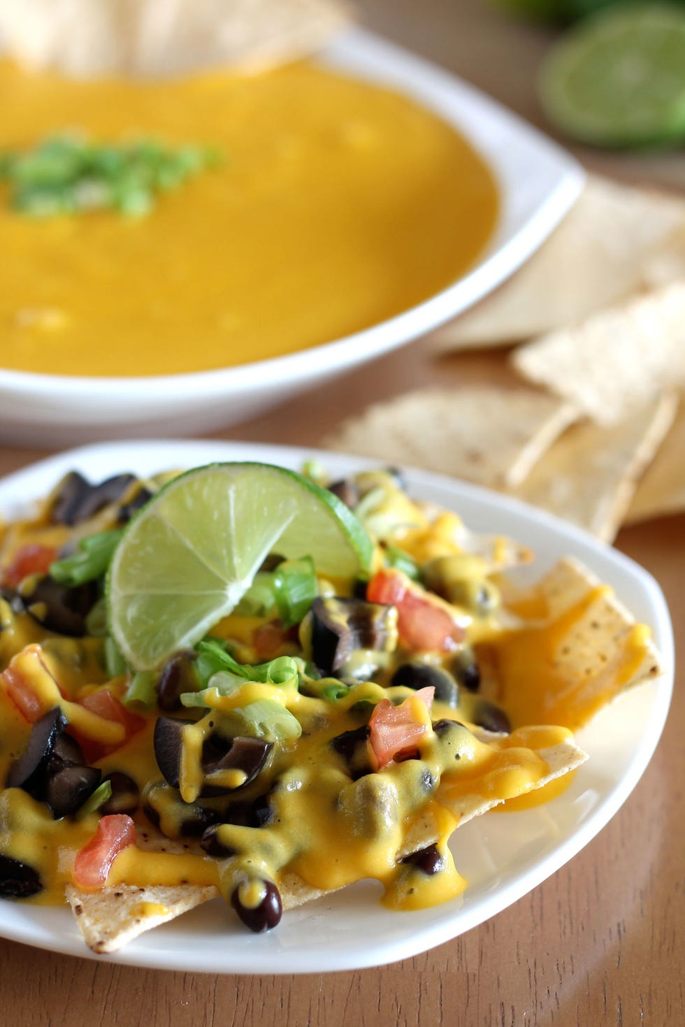 <p>Not only is this recipe gluten-free, it's also vegan, soy-, nut-, and corn-free, meaning no one will find anything to not like. Drizzle over nachos or use as a dipping sauce for veggies like broccoli and cauliflower.</p>
<p>Get the recipe at <a href="http://veganyumminess.com/vegan-nacho-cheese/">Vegan Yumminess</a>.</p>
