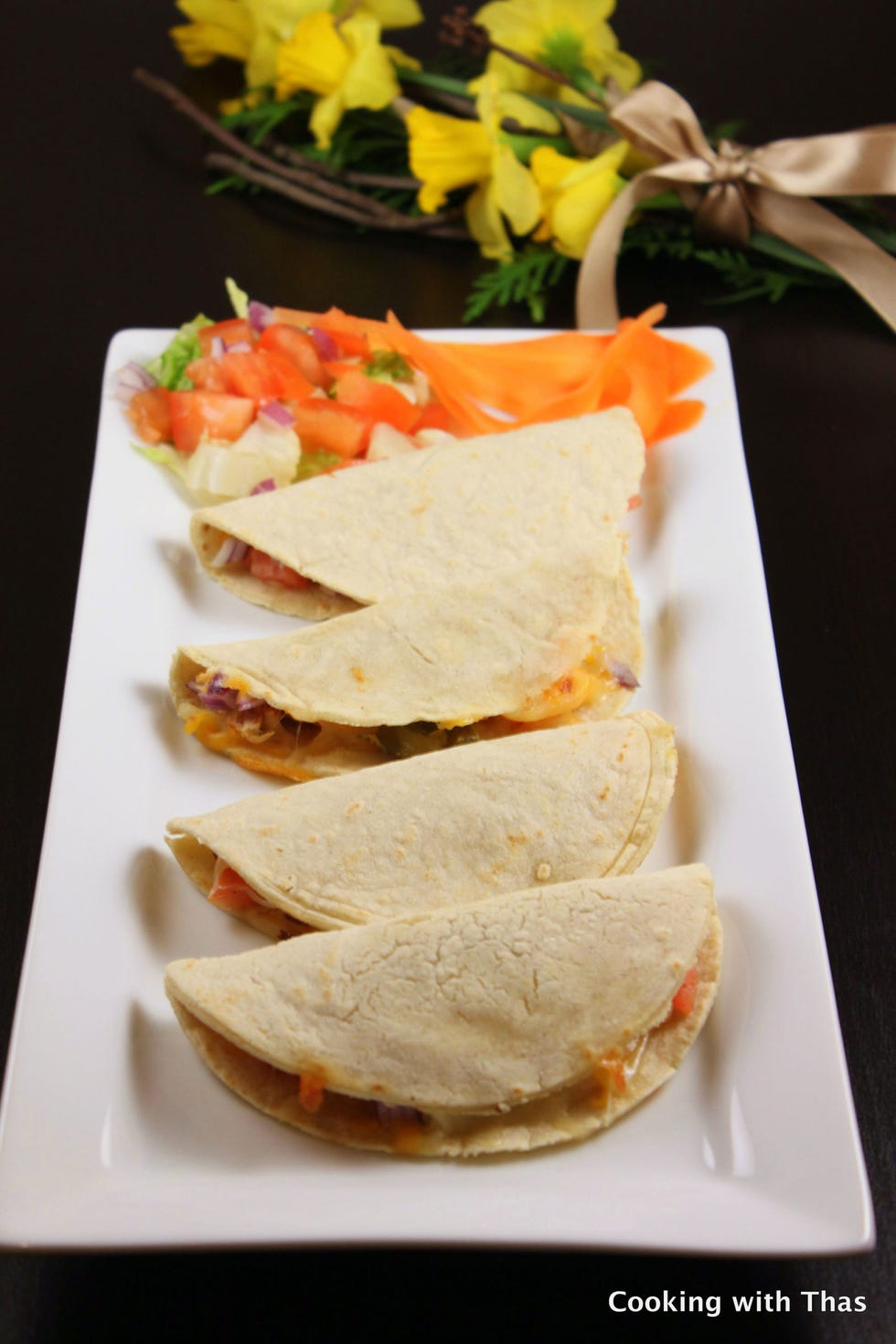 <p>Making quesadilla shells from scratch does take some work, but when you use masa harina, a traditional Mexican flour, it's worth the trouble. Adorn with seasoned chicken, red onions, tomatoes, jalapenos, and cheese for a personal-sized Super Bowl fiesta.</p>
<p>Get the recipe at <a href="http://www.thasneen.com/cooking/chicken-quesadilla-gluten-free/">Cooking with Thas</a>.</p>