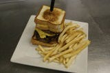 <p>Go ahead, double down on the comfort food! At <a href="http://www.oddfellowsburgerkitchen.com/" target="_blank">Oddfellows</a>, you'll only have to order one dish. The Grilled Cheese Burger is exactly what it sounds like, and just as decadent. Grilled cheese sandwiches replace burger buns in a stroke of pure comfort food genius. Don't worry about the balance — Oddfellows thought of that, too, stuffing in two double cheeseburgers for ideal meat to cheese to bread ratio.</p>
<p><em><strong>Oddfellows Burger Kitchen:</strong> 823 Wheeler St, Ames, IA 50010; (515) 292-2066; <a href="http://www.oddfellowsburgerkitchen.com/" target="_blank">oddfellowsburgerkitchen.com</a></em></p>