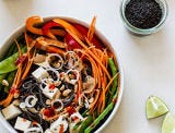 <p>Don't let the black noodles throw you off—they're made from black beans, meaning this recipe is both gluten-free and vegan. But it's still packed with flavor thanks to a peanut sauce sweetened with maple syrup.</p>
<p><strong>Get the recipe from <a href="http://www.edibleperspective.com/home/2014/4/2/easy-veggie-noodle-bowl-with-peanut-sauce.html" target="_blank">Edible Perspective</a>.</strong></p>