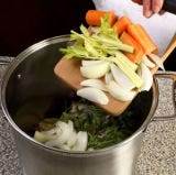 Rich Homemade Chicken Stock <p>Chicken stock is the go-to variety for many home cooks. Rich in flavor and relatively cheap and easy to prepare, making homemade chicken stock is a great way to use up the bones and other odds and ends you have left after roasting a bird for family dinner. Using a little leg meat — as called for in the first recipe below — adds even more savory flavor, and browning the chicken and vegetables first before adding the liquid will add more depth to the final product.</p><p><b>Recipe: <a href="/recipefinder/rich-homemade-chicken-stock-recipe-5737">Rich Homemade Chicken Stock</a></b></p><p><b>Recipe: <a href="/recipefinder/chicken-stock-663">Chicken Stock</a></b></p>