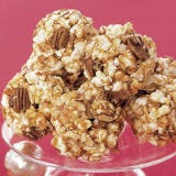 <p>A classic carnival-style snack, these gooey, sugary popcorn balls are packed with crunchy pecans, almonds and sweet flaked coconut.</p><p><b>Recipe:</b> <a href="/recipefinder/old-fashioned-popcorn-balls-880"><b>Old-Fashioned Popcorn Balls</b></a></p>