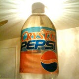 Liquid, Product, Bottle, Plastic bottle, Drink, Drinkware, Orange, Bottle cap, Ceiling, Carbonated soft drinks, 
