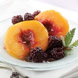 Lavender-Poached Peaches and Blackberries <p>When you think of broths and stocks, sweets probably aren't the first thing that come to mind. But though this recipe might not include a traditional, meat-based broth, it is poached in a fragrant liquid that infuses the whole dessert with a heady, lavendar-infused sweetness.</p>
<p><b>Recipe:</b> <a href="recipefinder/lavender-poached-peaches-blackberries-recipe-ew0712"><b>Lavender-Poached Peaches and Blackberries</b></a></p>