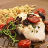 <p>The Mediterranean flavors of a warm tomato tapenade will brighten all kinds of white fish as well as chicken. Make it a meal: Orzo and sautéed spinach will round out this meal.</p><br /><p><b>Recipe:</b> <a href="/recipefinder/roasted-cod-warm-tomato-olive-caper-tapenade-recipe-5293" target="_blank"><b>Roasted Cod with Warm Tomato-Olive-Caper Tapenade</b></a></p>