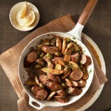 <p>Frying the potatoes and sausages before adding the rest of dish's ingredients gives them an irresistible crispiness. The addition of lemon and white wine brings depth and brightness of flavor to an otherwise run-of-the-mill meal of meat and potatoes.
<br />
By Cheryl Slocum</p><br /><p><b>Recipe:</b> <a href="/recipefinder/potatoes-sausages-olives-lemon-parsley-recipe-clv0211" target="_blank"><b>Potatoes and Sausages with Olives, Lemon, and Parsley</b></a></p>