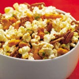 <p>If plain popcorn is too wimpy for your taste buds, try this mix brimming with flavorful add-ins: unsalted nuts, wasabi peas, pretzels, and cheese snacks, all tossed with smoked paprika and garlic and onion powders.</p>
<p><strong>Recipe:</strong> <a href="../../../recipefinder/gridiron-snack-mix-recipe-122478" target="_blank"><strong>Gridiron Snack Mix</strong></a></p>