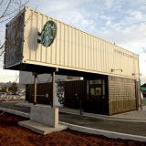 Sustainable Starbucks: Tukwila, WA <p>In December 2011, Starbucks opened its first concept store, called a "Reclamation Drive-Thru." The Washington state-based sustainable outpost is made from repurposed shipping containers. Starbucks got the inspiration at its Seattle headquarters, where they look out at hundreds of shipping containers that have no current use. The 450-square-foot drive-thru and walk-up store is made from four end-of-life-cycle shipping containers that, according to Starbucks, have been "reclaimed, refurnished, renewed, and revived." There's another Reclamation Drive-Thru in Colorado, and the company intends to open more.</p><p><i><a href="http://www.starbucks.com/" target="_blank">Starbucks Reclamation Drive-Thru</a>, 10100 East Marginal Way South, Tukwila, WA</p>