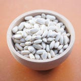 Small, white Italian members of the haricot bean family. Used in minestrone and other soups and in Tuscan dishes such as beans baked with pancetta and garlic or chilled beans with tuna.