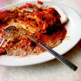 <p>Mary and Tito's may not look like much from the outside, with its sun-faded sign and exterior, but this nearly 50-year-old adobe café was recognized as an American Classic by the James Beard Foundation in 2010. The famed secret weapon of this mother-daughter-run operation is its fiery red chile sauce — killer with succulent braised pork in the New Mexican classic carne adovada, or drizzled over beef tacos in crisp corn tortilla shells. <i>505-344-6266.</i></p>