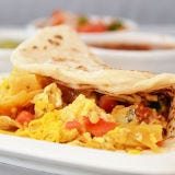 <p>This family-run San Antonio favorite specializes in the breakfast taco, done in pure Tex-Mex style: House-made, oversized tortillas are puffed up in a deep fryer until they're all crunch and air, then piled with egg and cheese and accompanied by any combination of bacon, beans, chorizo, and ham. Locals know the slow-roasted, smoky barbacoa is only available on weekends.</p><p><a href="http://www.tacotacosa.com" target="_blank"><i>tacotacosa.com</i></a></p>
