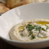 Mon-Fri: 5-7p.m.
<br /><br />
Empire builder Michael Solomonov’s upmarket Israeli spot sells its incredible, creamy hummus—which comes in four varieties, including one with fava beans—for half price ($4-$6). Specialty cocktails like the $12 Midtown Roots (rye whiskey, sassafrass and vanilla) are $4 off. 
<br /><br />
<a href="http://www.zahavrestaurant.com/" target="_blank">zahavrestaurant.com</a>