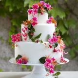 Give your cake a garden-fresh look by adorning it with lush blooms in colors that match your palette.