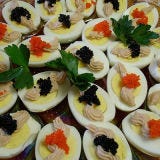 With the 1960s focus on pricey ingredients, deviled eggs found themselves topped with caviar.