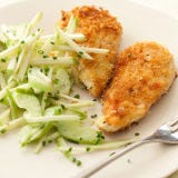 <p>Skipping the egg batter and heading straight for the bread crumbs cuts the fat and calories in these panko-crusted chicken cutlets, as does a tangy side salad made with lowfat sour cream.</p><p><b>Recipe: </b><a href="/recipefinder/chicken-cutlets-apple-celery-salad-recipe-122842" target="_blank"><b>Chicken Cutlets with Apple and Celery Salad</b></a></p>