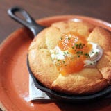 <p><strong>Anyone who argues</strong> that authentic southern food has no place in Chicago probably also thinks a New Yorker couldn't edit a Faulkner novel. The Great Migration brought millions of southerners to northern cities in the early- to mid-twentieth century. Moreover, chefs today tend to go where the work is, so it's logical that a chef from, say, Johns Island, South Carolina, ends up cooking his heart out in Illinois and finding takers.</p>

<p>With communal tables and farmhouse accents that avoid Epcot Center phoniness, Carriage House is close in spirit and flavor to the best restaurants in Charleston, Savannah, Atlanta, and Memphis, and better than many. It's easy to love creamy she-crab soup and Carolina rice balls spiked with pimento cheese—that stuff is irresistible even when it's just okay, and these are stellar. But chef Mark Steuer has a deep strain of the low country in him, especially its sea islands and marshes. He refines beloved dishes so that they're true to form yet entirely his—like skillet corn bread with foie-gras butter, nectarine marmalade, and smoked salt. His low-country boil bubbling with shrimp, clams, corn, and rabbit sausage is, like everything he serves, steeped in history. But history isn't what makes his reimagined dishes so great. It's the reimagining.</p>

<p><em>1700 West Division Street; 773-384-9700; <a href="http://www.carriagehousechicago.com/" target="_blank">carriagehousechicago.com</a></em></p>