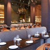 Embeya, Chicago <p><strong>There is a tendency</strong> among aficionados of Southeast Asian food to resist high-end restaurants in favor of storefront eateries where no dish costs more than $12. This can indeed be a rewarding way to go through life. But Embeya—"little one" in Vietnamese, the childhood nickname of chef Thai Dang—is that rare, beautifully designed Asian restaurant that can please big spenders and dumpling sniffers alike.</p>
<p>It's a large corner space with a hundred seats and a lively bar, done up with carved teak panels and chandeliers that look like airborne ice crystals. Vast windows frame the streets of the West Loop. You're greeted by the gorgeous Indian-born Komal Patel and her impeccably dressed Hungarian husband, Attila Gyulai, whose long tenure with the Four Seasons hotel chain invests Embeya with civilized hospitality. Dang learned the precision of Asian-fusion cuisine under two D. C.–based chefs, Eric Ziebold of CityZen and Susur Lee of Zentan, before helping Laurent Gras win three Michelin stars at Chicago's <a href="http://www.esquire.com/features/new-restaurants-2008/best-new-restaurants-2008" target="_blank">L20</a>.</p>
<p>Embeya's menu is predominantly Vietnamese but reels in Thai classics, like plump mussels in a limey coconut broth, maitake noodles with sea scallops and the crunch of Chinese celery, pungent garlicky chicken, and head-on prawns with roasted pineapple, tamarind, and chiles. The flavors all sound promising on the menu. They deliver on the plate.</p>
<p><em>564 West Randolph Street; 312-612-5640; <a href="http://www.embeya.com/" target="_blank">embeya.com</a></em></p>